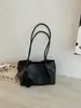 Bolso tejido de alta gama transfronterizo para mujer, nuevo bolso casual versátil de axila, bolso de hombro simple para mujer, al por mayor