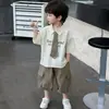 Conjunto de Camisa de Manga Corta de Verano para Niños 2026 Nuevo Estilo de Verano Pantalones Cortos Estilo Academia Infantil Ropa de Bebé de Moda