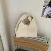 Bolso de Mano Plegado de Diseño de Nicho para Mujer 2026 Nuevo Bolso de Hombro/Axila de Gran Capacidad para Viajes Diarios Estilo Coreano Bolso Cubo
