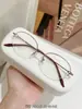 Armazones de anteojos de titanio puro para mujer, estilo business tradicional, colección de anteojos de medio aro ultraligeros, armazón de anteojos Danyang M0043