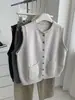 Colete de tricô redondo com borda enrolada e bolso retrô para mulheres, peça externa outono/inverno 2026, corte solto, emagrecedor, top casual para sobrepor