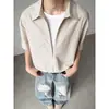 Camiseta Patchwork Listrada Falsa de Duas Peças com Manga Curta Tendência Verão 2026 para Homens no Estilo Old Money