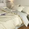 Juego de ropa de cama de lujo de cuatro piezas de algodón de fibra larga de 80 hilos, sábana bajera 100% algodón, funda de edredón bordada, juego de tres piezas de alta gama