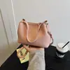 Bolso Saco Versátil de Gama Alta para Mujer Primavera/Verano 2026 Nuevo Bolso Cruzado de Moda para el Trabajo con un Toque Vintage y un Sentido de Sofisticación