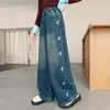Jeans de Primavera y Otoño para Niñas 2026 Nuevo Estilo Coreano Casual Pantalones de Pierna Ancha con Detalles de Corazón para Niñas Mayores, Transfronterizos
