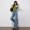 Jeans acampanados retro de mezclilla lavada azul de tiro medio-bajo para mujer, nuevo estilo otoño 2026, elásticos y que no se pegan, versátiles pantalones de campana