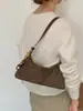 Bolso de mano retro de gamuza de nicho estilo coreano transfronterizo para mujer, nueva colección 2026, adecuado para el uso diario y para ir al trabajo, se puede llevar como bolso de hombro o bolso cruzado