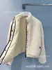 Versión de alta gama de la chaqueta con cremallera de lana de cordero gruesa "Shenzhen Nanyou", juvenil y versátil, nuevo estilo otoño e invierno, fresca y elegante