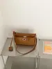 Bolso pequeño cuadrado transfronterizo nuevo con un toque de alta gama, bolso de hombro de lona moderno, bolso de mano y bolso de hombro versátil de estilo coreano de alta gama para mujer