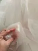Tejido especial seersucker de gasa brillante con perforaciones calientes, estampado en caliente con oro y plata, tela para vestido de novia, tela para ropa, polvo
