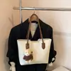 2025 Bolso Nuevo de Invierno Gran Capacidad Estilo Retro para Mujer Bolso de Mano Tejido Versátil para Clase Viajes Bolso de Hombro