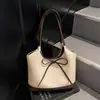 Bolsa de Ombro Moda Transfronteiriça Estilo Novo Primavera 2026 Ombro Único Textura Casual Moda Bolsa Tote Simples com Laço