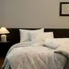 Juego de ropa de cama de cuatro piezas de lujo ligero de alta gama Lyocell Tencel para verano, funda de edredón de seda helada, sábana, sábana bajera, productos de ropa de cama
