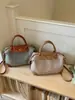 Bolso de mano de paja versátil de moda transfronterizo para mujer, nuevo bolso de hombro cruzado de gran capacidad informal para el verano de 2026