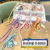 Colgante de concha curativa de moda, pulsera tejida, llavero de cadena de perlas, charm de bolso girly creativo, venta al por mayor