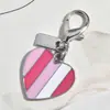 Nuevo Colgante Metálico Rosa Plateado Forma de Corazón Botella de Perfume de Cereza Llavero Accesorio Versátil para Bolsa Venta al por Mayor Dropshipping