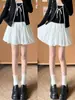 Falda de lunares blancos para mujer, nuevo estilo otoño 2026, dulce y femenina, de cintura alta, adelgazante, línea A, falda abullonada de capas