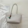 Bolsa de padrão trançado de grande capacidade para o dia a dia, novo modelo de verão 2026, bolsa tipo cesta de vegetais de alta aparência, bolsa tote moderna e única