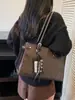 Dropshipping Otoño 2026 Nueva Moda Versátil Cuatro Estaciones Bolso de Mano para Mujer Bolso de Hombro Gran Capacidad para el Trabajo