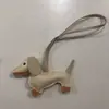 2024 nuevo cuero lindo perro salchicha colgante llavero cachorro colgante bolsa colgante caricatura colgante al por mayor
