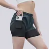 Pantalones cortos transpirables para entrenamiento de comercio exterior transfronterizo para hombres y mujeres, con forro anti-exposición, diseño de dos piezas falsas, adecuados para correr y deportes al aire libre