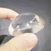 Alfombrilla anticolisión transparente transfronteriza para manija de puerta de refrigerador, pegatina anticolisión para pared, cojín de silicona suave sin costuras y silencioso para el hogar.