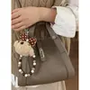 Bolsa de Mão Elegante Estilo Balde para o Dia a Dia de Mulheres 2026 Nova Moda Coreana Retrô de Ombro Único Transversal Bolsa Mãe e Filha