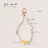 Correa de muñeca para teléfono versátil de perlas original con cadena cruzada de amatista soñadora, exquisito accesorio estilo ins