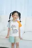 Camiseta de Verano para Niños Estilo Coreano de Manga Corta con Estampado de Dinosaurio para Niños y Niñas, Camisa de Cuello Redondo para Niños Pequeños y Medianos, Tops de Exterior para Niños