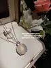 Guofeng Joyería Esmeralda Moyu Natural Huevo de Paloma Gema Collar Nuevo Estilo Chino Aretes de Tachuela de Esmeralda