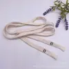 Suministro directo de fábrica cuerda plana hueca para sombrero suéter pantalones cuerda de algodón tejida pantalones de cuerda de algodón cuerda para sombrero 1.2 cm cinturón de cuerda de algodón bordado