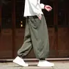 Nuevos pantalones de linterna a rayas texturizados estilo chino para hombre con cordón en la cintura elástica y pernera cónica tipo harén, estilo chino retro, pantalones para hombre de talla grande