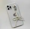 Estilo Xiao Xiang Llavero de Perla Grande con Lazo para Niña Colgante de Bolso Accesorios Alto Valor de Color Personalidad Versátil Blanco y Negro Ins