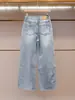 Shenzhen Nanyou ropa de mujer de alta gama verano nuevo moda diseño elegante nicho pedrería rotos jeans rectos