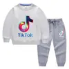 Conjunto de Ropa Infantil Transfronterizo Nuevo Primavera y Otoño 2026: Conjunto de Dos Piezas para Niños: Sudadera y Pantalón Largo, Atuendo de Algodón de Manga Larga de Color Sólido para Bebés