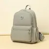 Mochila casual transfronteriza para mujer 2026 modelo nuevo de otoño bolsa de nailon simple versátil ligera mochila de moda para damas