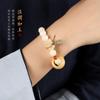 Caramelo de leche de carbón pulsera de oso de la suerte pulsera de raíz de Bodhi niña buena suerte oso lindo jade blanco Bodhi pulsera linda