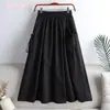 Falda 2023 nueva verano estilo coreano color liso con cordón de amarre bolsillo longitud media talla grande ropa de trabajo falda línea A para mujer