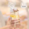 Novo copo de plástico popular da moda copo de água portátil para esportes ao ar livre copo de viagem para estudantes com tampa de abrir copo espacial simples e criativo