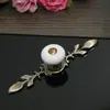 Puxador de Gaveta de Armário de Roupa de Cerâmica Bronze Estilo Moderno Minimalista Chinês Puxador Branco em Forma de Tira de Furo Único