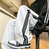Calça masculina atacado de fábrica, toque de luxo leve e de alta qualidade, calça casual esportiva versátil para jovens para outono, perna reta, para uso ao ar livre