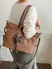 2026 Nueva Tendencia de Moda Otoño Invierno Bolso de Mano de un Hombro para Mujer Gran Capacidad Bolso Bowling de Moda Versátil Estilo para Viajar