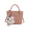 Bolsa transversal de ombro único com laço doce estilo coreano para mulheres, design de nicho, bolsa de mão de cor sólida, mochila moderna e versátil