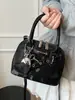 2025 Nueva Moda Tendencia Diseño Nicho Bolso de Concha de Mano Estilo Coreano Estilo Extranjero Versátil para Viajes al Trabajo Crossbody Bolso de Mujer