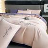 Juego de cuatro piezas bordado de alta gama de lujo ligero Cubrecama Funda de edredón de algodón lavado Sábana de cama Lijado para las cuatro estaciones Juego de tres piezas para dormitorio Ropa de cama