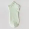 Meias de malha de cor pura para verão e outono Meias Moda universitária japonesa Meias femininas versáteis de cano baixo para tornozelo Venda por atacado de fábrica