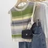 Entrega em peça única cor contrastante redutor de idade fino sem mangas colete feminino listrado de tricô hot girl slim fit bm top curto verão