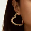 Pendientes de Moda Transfronterizos de Gama Alta con Giro de Corazón Pendientes Nicho Estilo Metálico Lujo Ligero Pendientes Huecos de Corazón de Durazno Pendientes