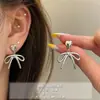 Brincos de Laço Coreanos, Brincos de Luxo Leve e de Alta Qualidade para Mulheres, Design de Nicho Moderno, Brincos Modernos e Elegantes, Atacado