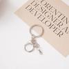 Chaveiro de liga três peças DIY acessórios de joia bolsa pingente de crochê Chaveiro 8 palavras 4 correntes fecho lagosta